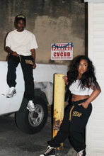 Load image into Gallery viewer, &quot;BarbWire Logo Fashion District Sweats&quot; SWEATPANTS BLACK W/YELLOW