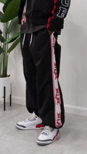 Load image into Gallery viewer, &quot;BAGGY DADDY NYLONS&quot; WIDELEG NYLON PANTS (BLACK W/ WHT &amp; RED PANEL)