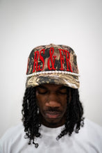 Load image into Gallery viewer, &quot;LOVERS AND FRIENDS&quot; STRAP HAT (CAMO W/ RED)