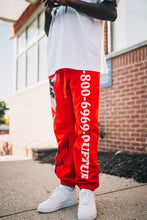 Load image into Gallery viewer, &quot;LIVE LIFE&quot; COLLECTION &quot;1-800-6969&quot; SWEATPANTS (RED W/ MULTI)