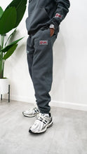 Load image into Gallery viewer, &quot;THE PLANE JANE STAPLE SET FW 25/26&quot; HOODIE (CHARCOAL W/ BLACK)