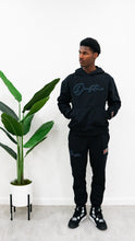 Load image into Gallery viewer, &quot;THE PLANE JANE STAPLE SET FW 25/26&quot; HOODIE (BLACK W/ NAVY)