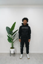 Load image into Gallery viewer, "THE 2.0 STAPLE SET FW 25/26" PULLOVER HOODIE (BLACK W/ GREY)