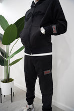 Load image into Gallery viewer, "THE PLANE JANE STAPLE SET SPRING 26" FULLZIP HOODIE (BLACK W/ BLACK)