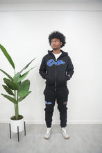 Load image into Gallery viewer, "THE PLANE JANE STAPLE SET SPRING 26" FULLZIP HOODIE (BLACK W/ BLUE)