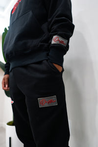 "THE PLANE JANE STAPLE SET FW 25/26" HOODIE (BLACK W/ RED)